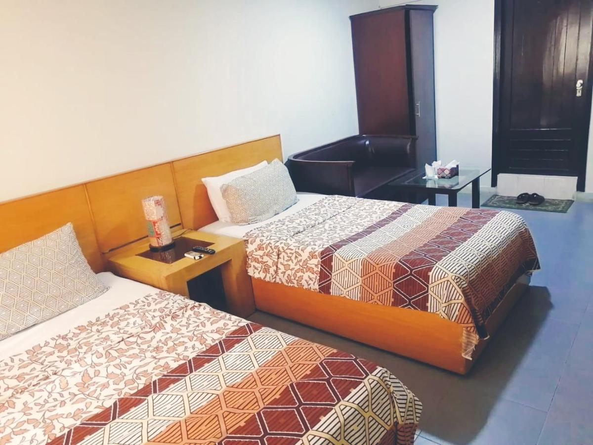 Hotel Rooms Dha Karaçi Oda fotoğraf