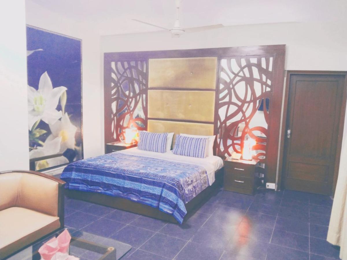 Hotel Rooms Dha Karaçi Oda fotoğraf
