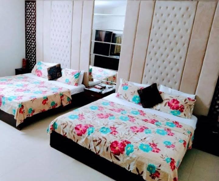 Hotel Rooms Dha Karaçi Oda fotoğraf