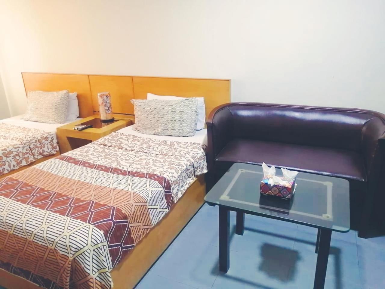 Hotel Rooms Dha Karaçi Oda fotoğraf